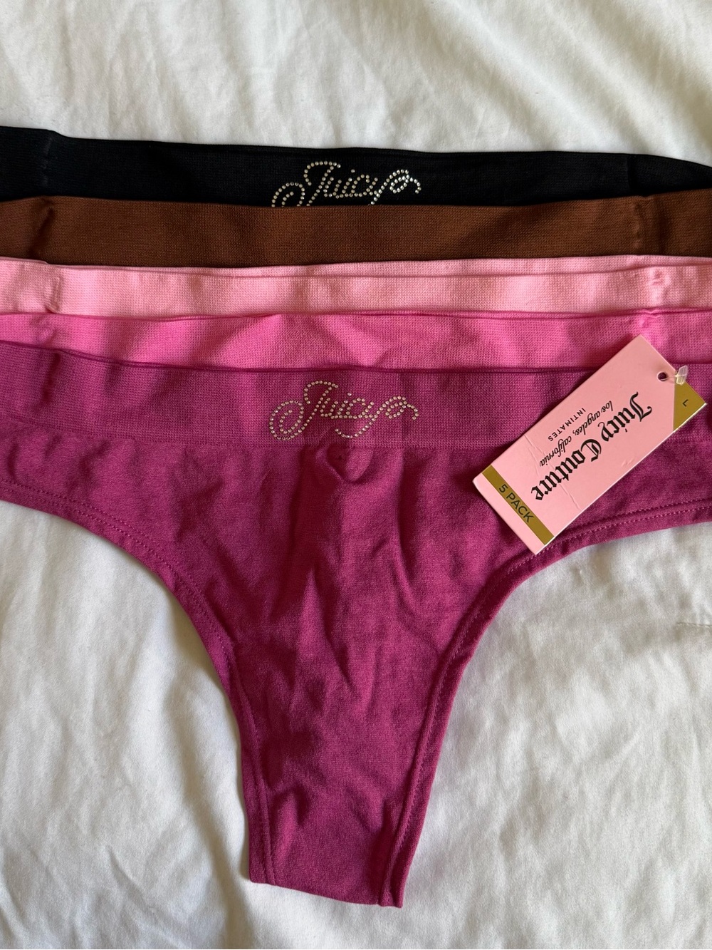 Juicy Couture 4-Pack Rhinestone Logo Thongs - Black, Brown, Light Pink, Magenta